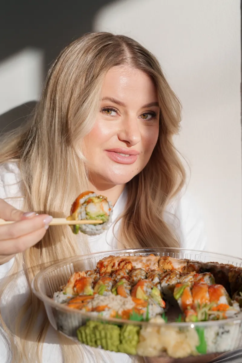 UGC creator tasting sushi for a restaurant campaign